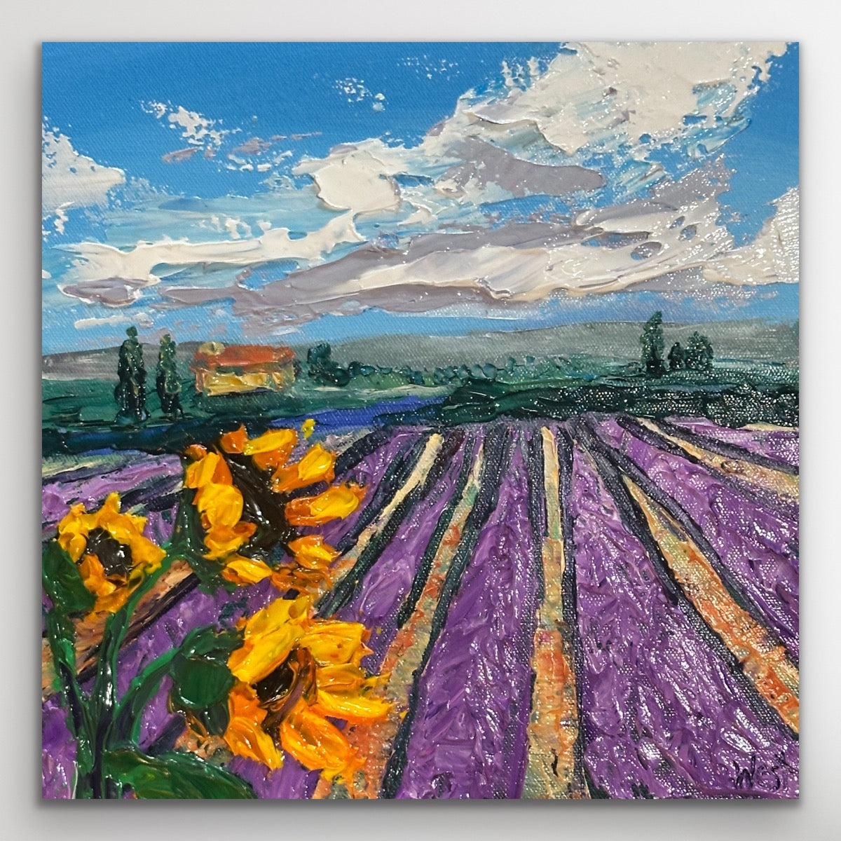 Painting of sunflowers and lavender field with a blue sky.