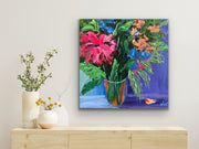 Colorful palette knife impasto floral painting on a wall above a wooden cabinet with decorative vases.