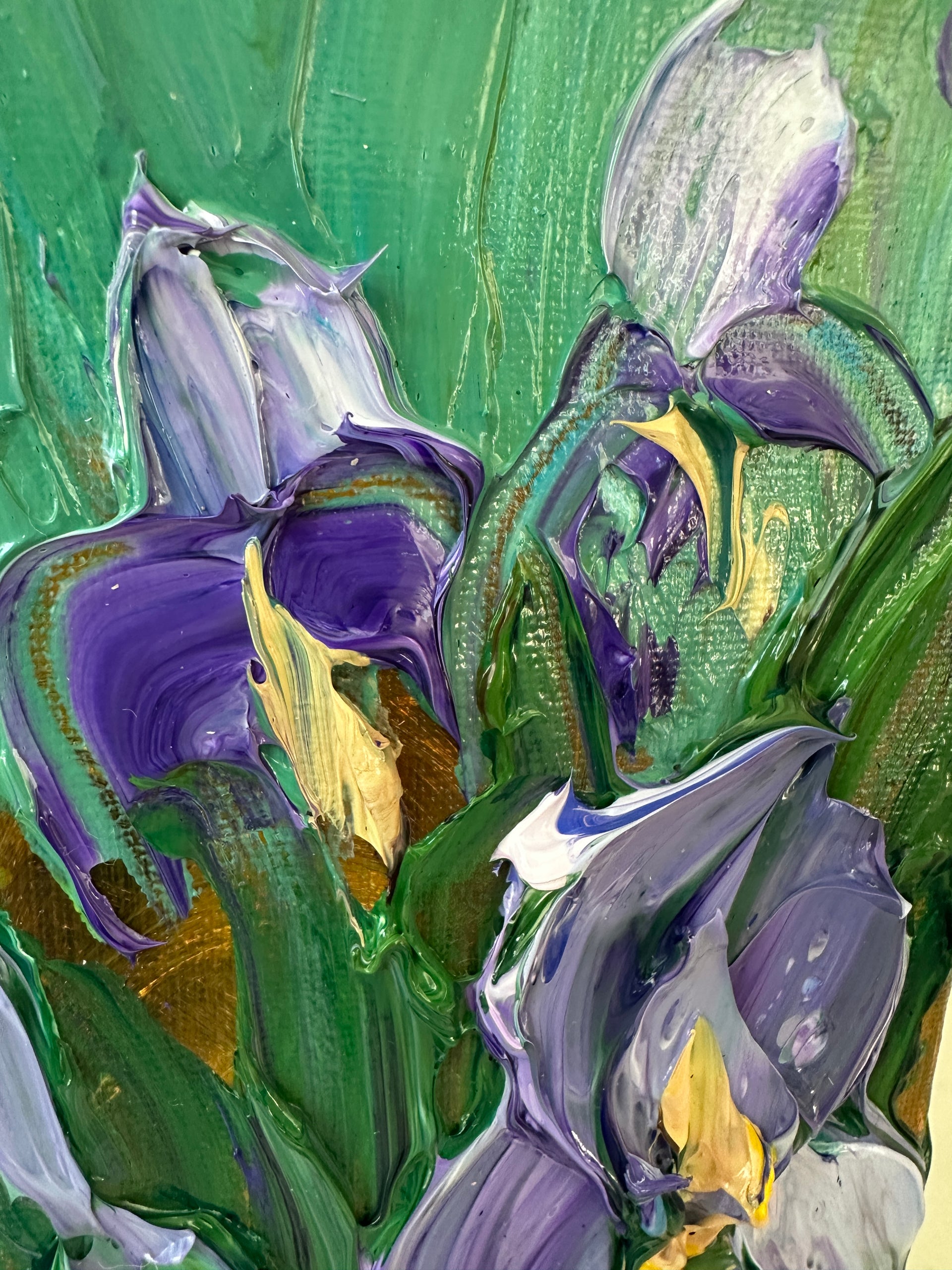 Close-up of a textured palette knife impasto painting with purple, green, and yellow colors.