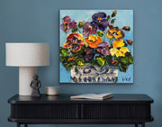 Original impasto palette knife painting of a pot of colorful pansies
