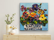 Original impasto palette knife painting of a pot of colorful pansies
