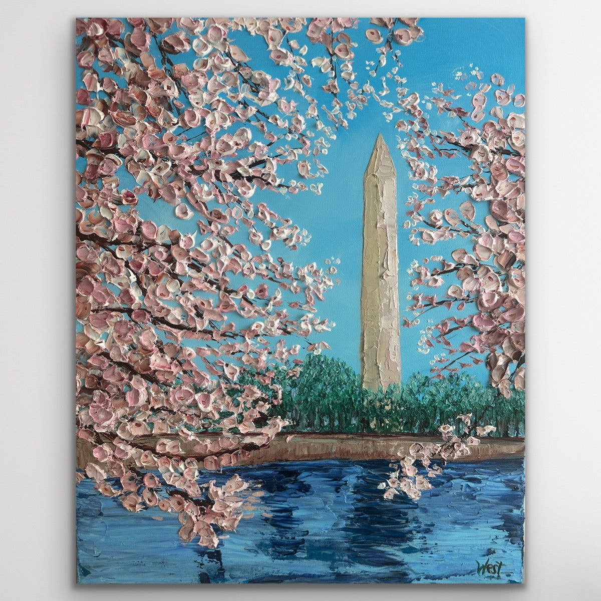 Painting of cherry blossoms with a monument in the background
