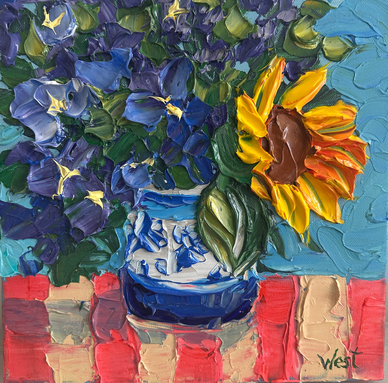Impasto palette knife painting of a sunflower and blue flowers in a vase on a textured background
