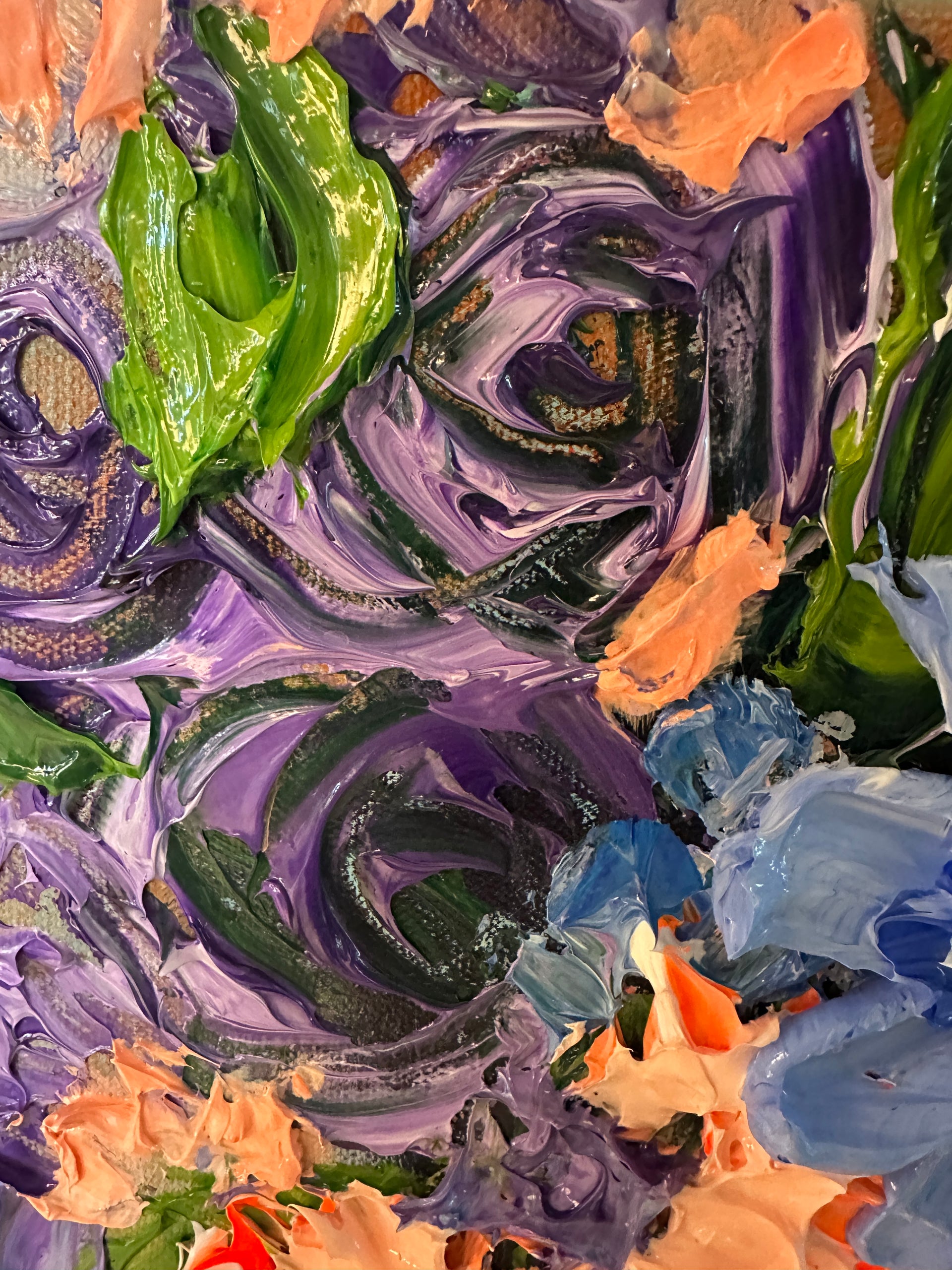 Detail of palette knife art with swirling colors of purple, green, and orange.