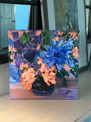 Floral palette knife impasto painting with blue and purple flowers on a wall
