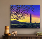 Painting of the Washington Monument with birds flying over a purple sky on a beige wall.